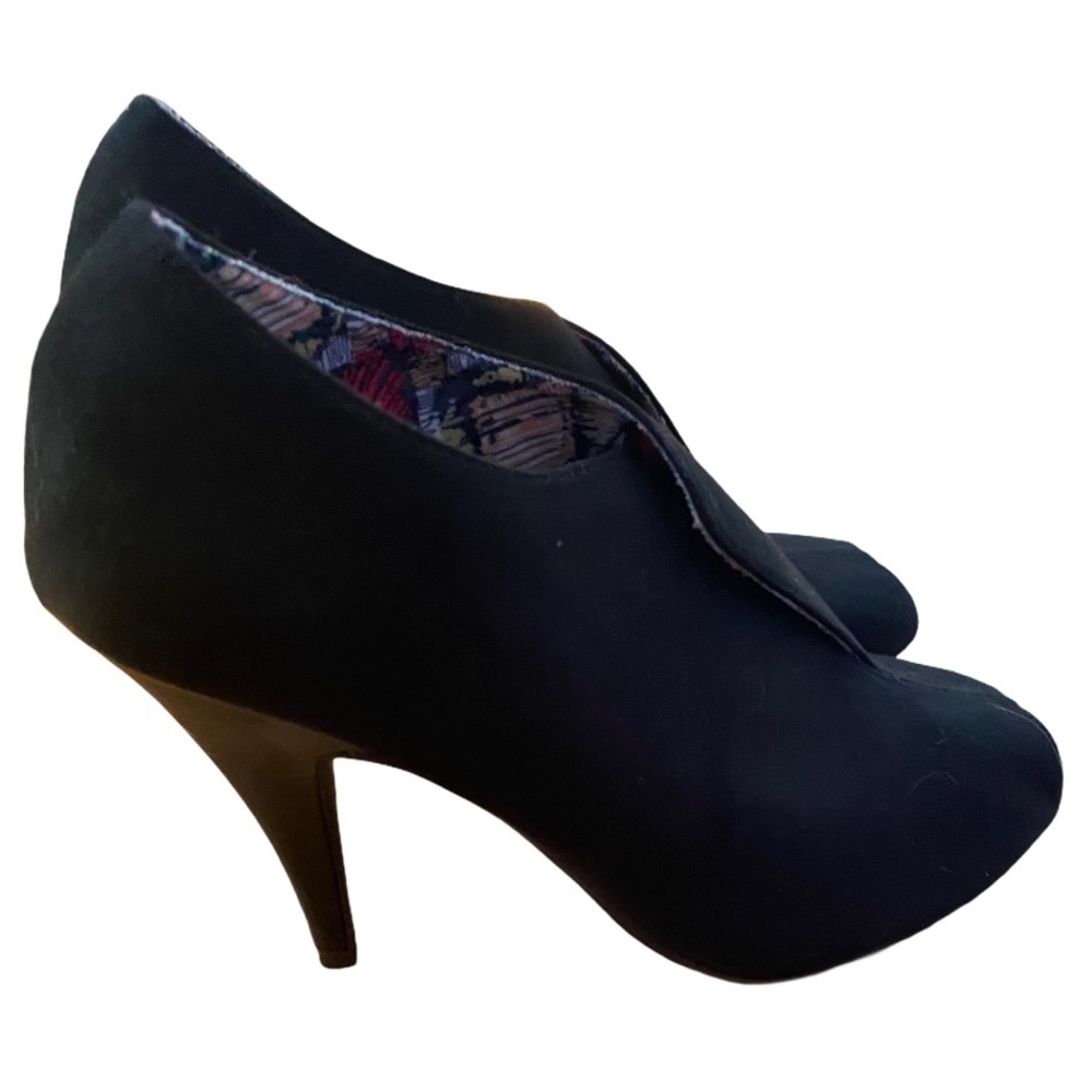 Black heels bought and never worn.